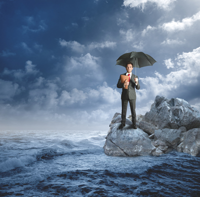 man safe under umbrella in uncertain weather